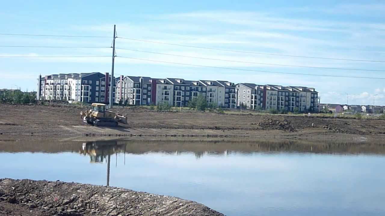 John Deere 850J WLT storm water pond subgrade YouTube