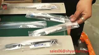YB-250X   FLOW PACKINGMACHINE FOR HOTEL USE TOOTHPASTE AND TOOTH BRUSH PACKING