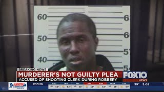 Convicted killer now charged with robbery pleads not guilty