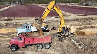 GMC Dump Truck Dumping & John Deere 790 Excavator Loading
More work getting done at the cranberry marsh.
Things that you might like:
Detroit Diesel Shirt: https://amzn.to/3QQxalH
Detroit Diesel Hat: https://amzn.to/4ln53bQ
200,000lbs Recovery Strap: https://amzn.to/3FH9rSD
45,000lbs Recovery Strap: https://amzn.to/42csgWt
Diecast Dump Truck: https://amzn.to/4l2NSMg
This video contains affiliate links, which means that if you click on one of the product links and buy, Ill receive a small commission. GMC Dump Truck Dumping & John Deere 790 Excavator Loading