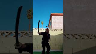 Cutting An Apple With A Katana