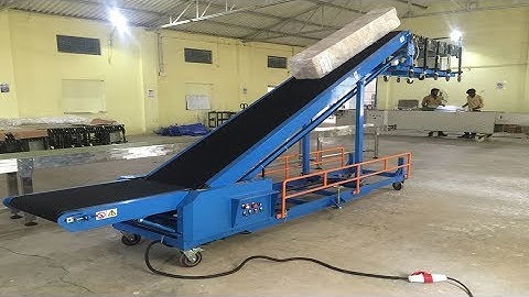 Automatic trailer/van/truck/container loading and unloading conveyor