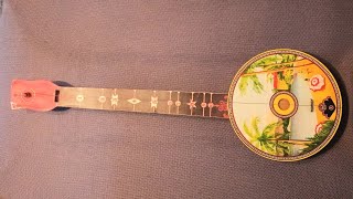 Antique one-string toy Hawaiian Banjo, "Amazing Grace" and "Farmer in the Dell"