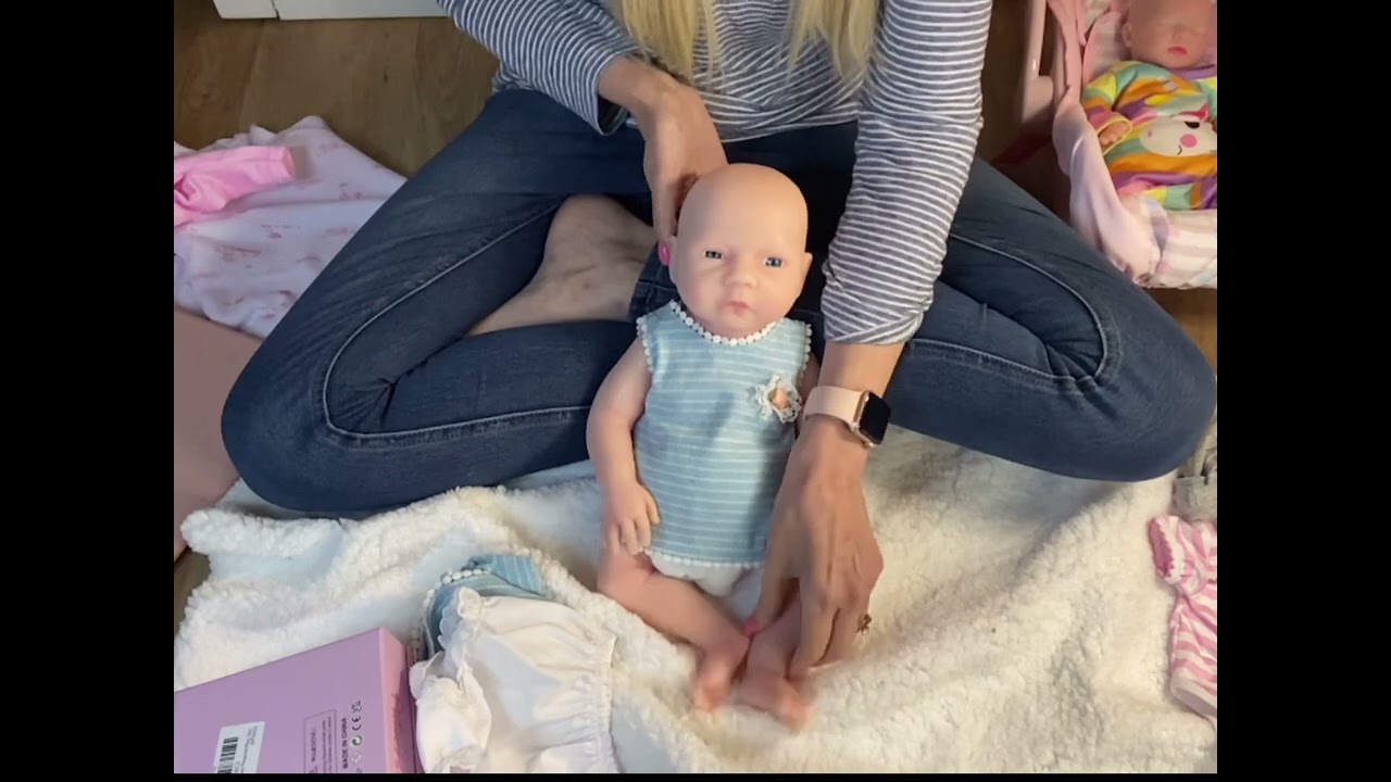 Little silicone reborns Emma and Mia new outfits