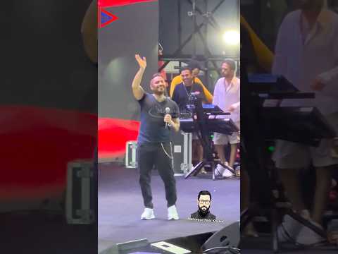 تامر حسني يشعل حفل الساحل ويستقبل بوكيه ورد من الجمهور