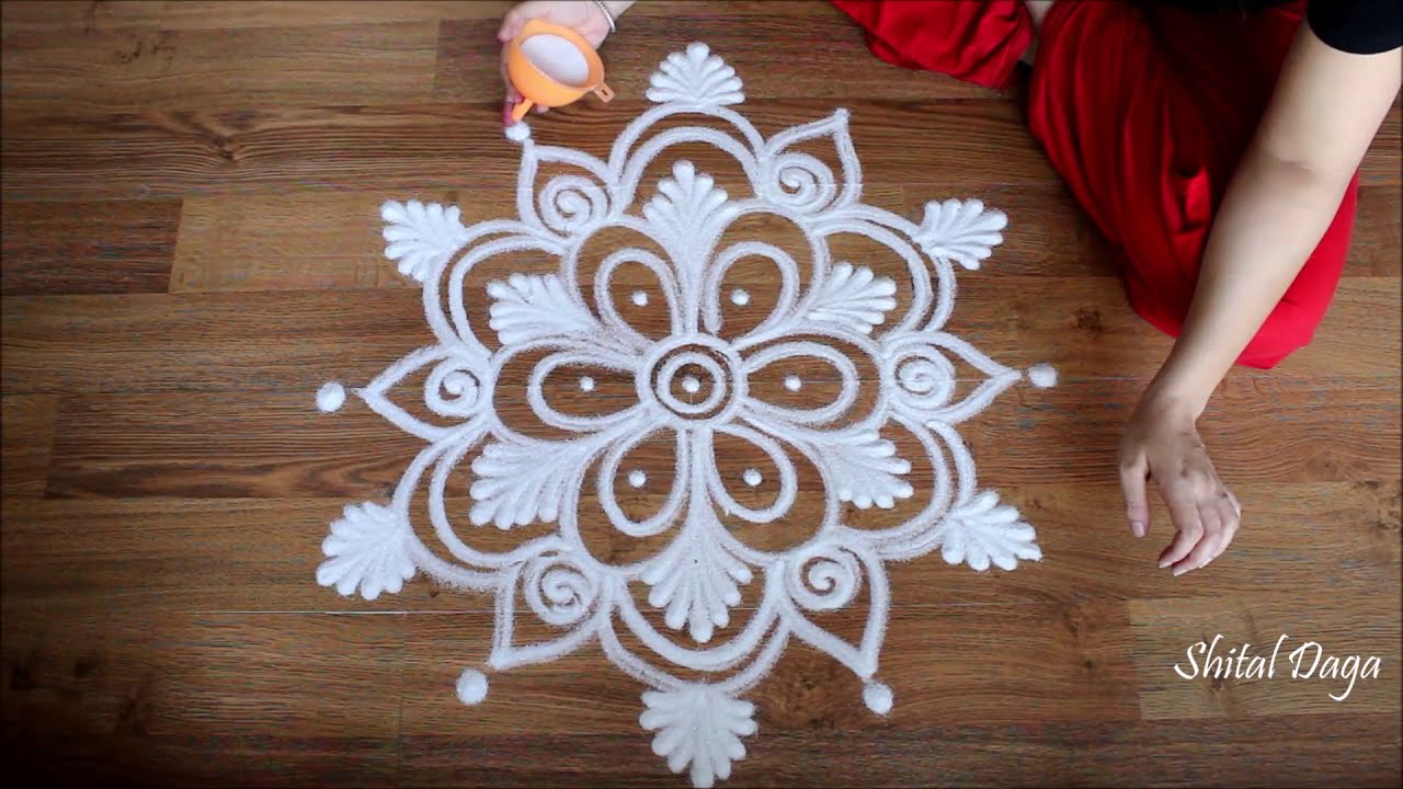 Very attractive white freehand rangoli design for Diwali by Shital ...