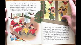Ash reads Walt Disney’s Mickey Mouse Goes Christmas Shopping by Bob Moore and Xavier Atención