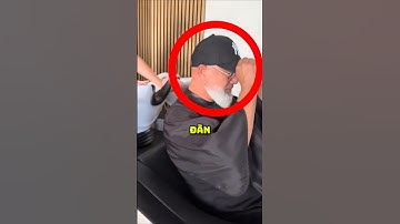 Người đàn ông trả tiền cắt chỉ một sợi tóc