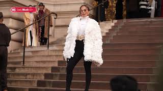 Jennifer Lopez Cuts Paris Fashion Week