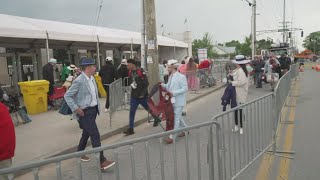 Churchill Downs infield crowds wait for gates to open on Derby Day