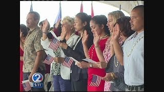 New US citizens sworn in at naturalization ceremony