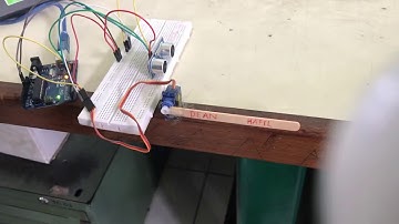 Arduino Mengatur Servo Menggunakan Sensor Ultrasonik