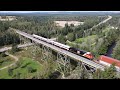 Awesome 4k views long stack train cn 120 wdpus  business train on trestle at east mines ns