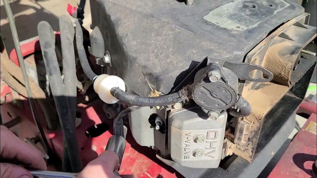 spring mower maintenance, changing spark plugs in Exmark 36 inch turf