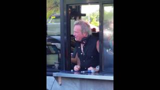 Joey Kramer serving his coffee at his Rockin and Roastin cafe drive-thru