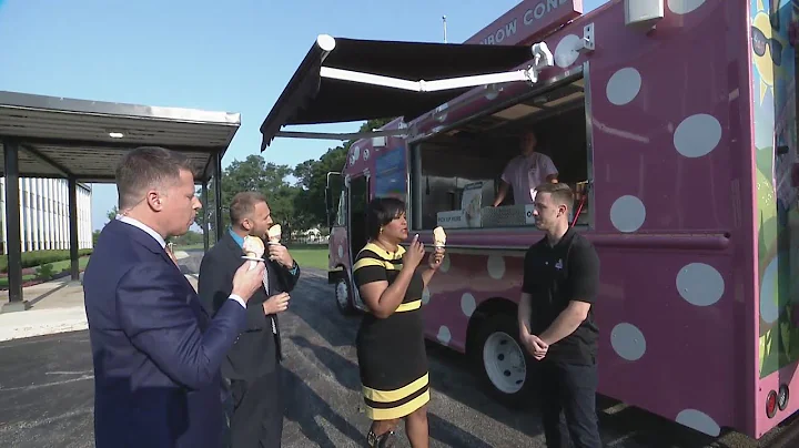 Rainbow Cone rolls by to give Tonya her first taste!