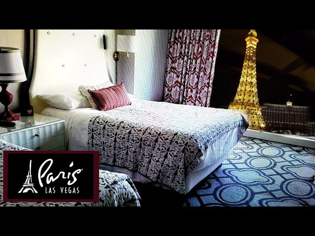 Paris Hotel in Las Vegas. Two queen bed burgundy room with strip
