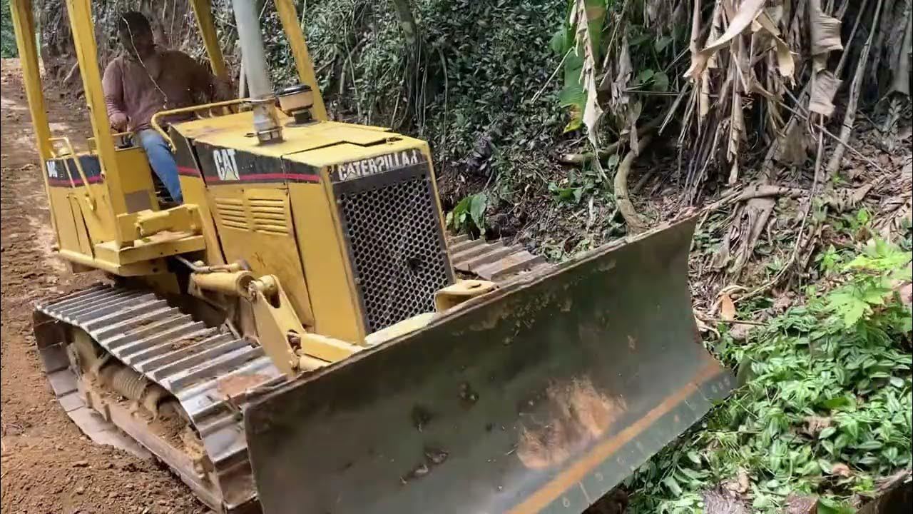 Caterpillar D4 cutting new road in the mountains of Puerto Rico YouTube