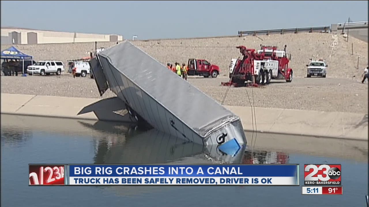 Big Rig crashes into the California Aqueduct - YouTube