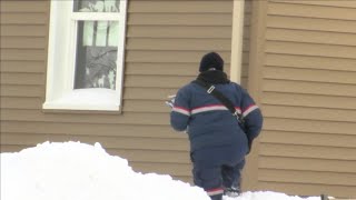 'Today's been a big challenge'; Mail carrier describes working after snow storm