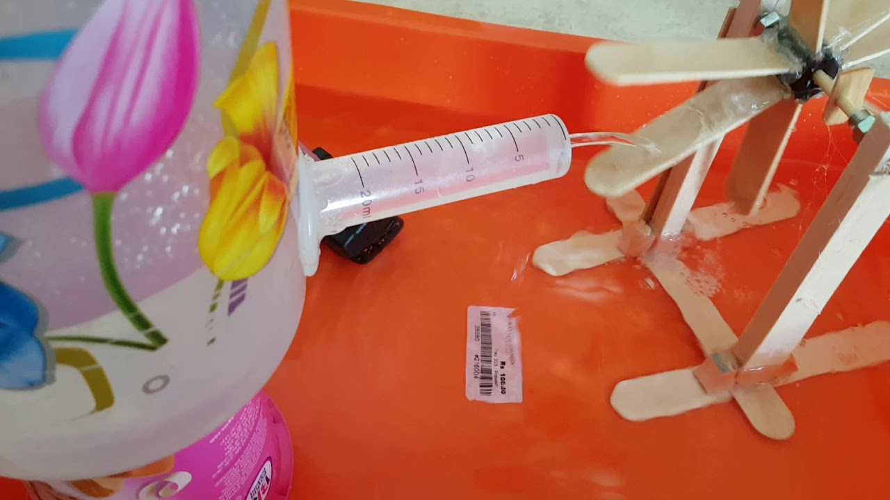 Water fountain using waste material /with aqua moter/science