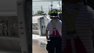 An overturned tanker truck spilled thousands of gallons of fuel onto a Queens roadway,