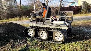 :     .Homemade tracked all-terrain vehicle second exit.