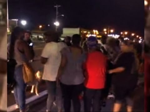Raw: Gunshots After Car Hits Ferguson Protester