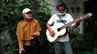 VIRAL SHOLAWAT ALLAHUMARHAMNA BILQURAN OLEH PENGAMEN NONENG NURUL MUPIDAH DAN IYAN