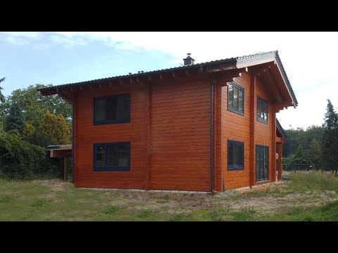 Video: Bau Eines Holzhauses
