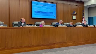 Catawba County commissioners Cole Setzer and Robert Abernethy talking about making cuts in the next