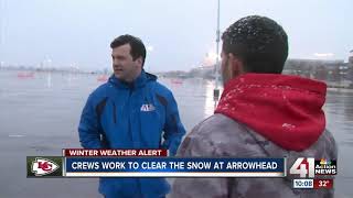 Crews work to clear the snow at Arrowhead
