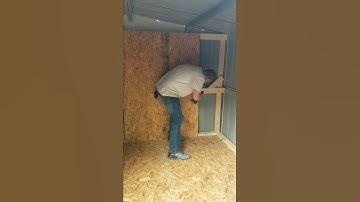 Ryan finishing the shed