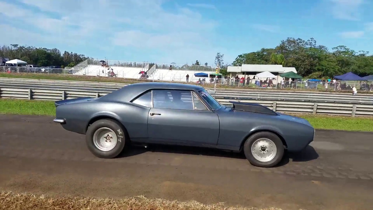 Race track grand reopening in Hawaii. Muscle cars in paradise, and we