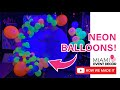 Neon Balloons | Round Backdrop with neon balloon garland