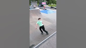 Skater is doing aggressive inline tricks!