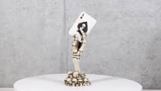 Gothic Skeleton Hand With Skull Ace of Spades Card On Ossuary