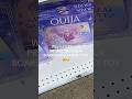 colorful d€monic ouijaboard sold at 5 below