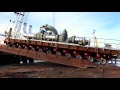 Loading a pipe module to a barge