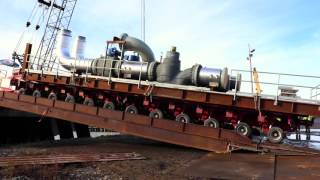 Loading a pipe module to a barge