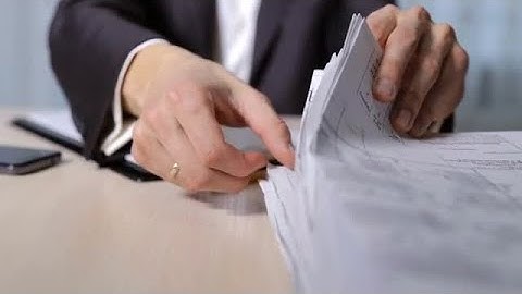 Design Engineer Reviews Drawings Stock Video