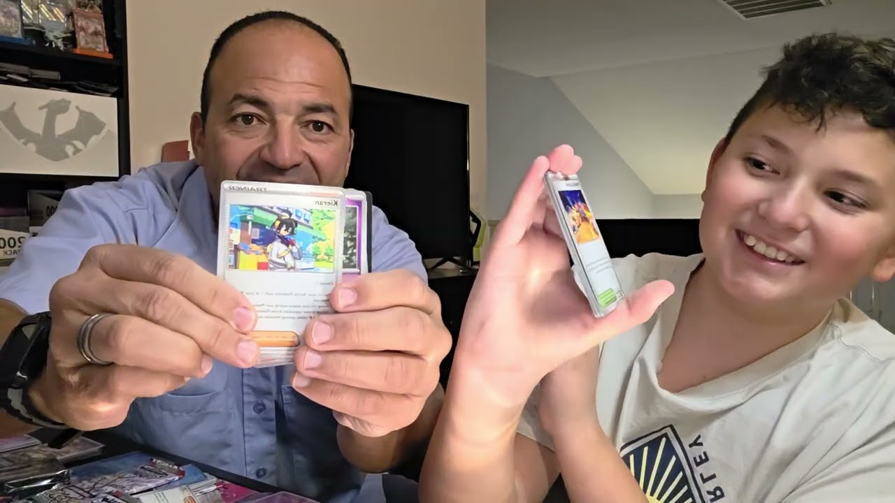 Watch PokeGray & Dad pack battle Prismatic Evolutions premium figurine Collection and get cooked