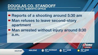 Shots fired lead to 3-hour standoff in Lawrence apartment building, 1 arrested
