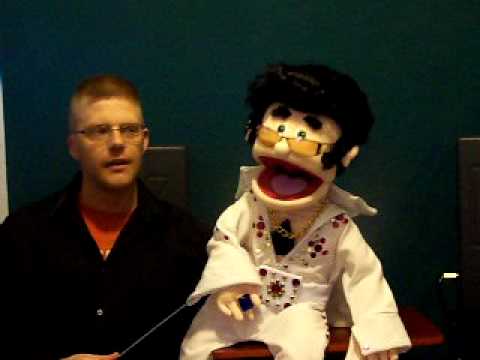 Elvis impersonating puppet sings Elvis tunes with ventriloquist Dale Romleski