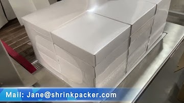 Shrink wrapping machine for catons stacking pack