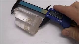 Gemstone faceting: cutting  a huge quartz stone (portuguese cut)