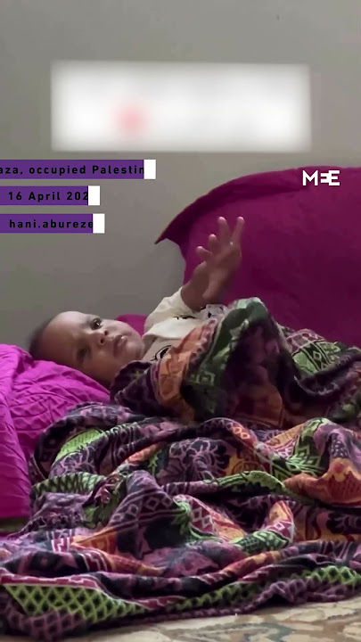Palestinian baby wakes up to sound of Israeli air strike