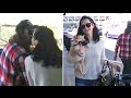 Krysten ritter gives boyfriend adam granduciel a kiss goodbye at lax