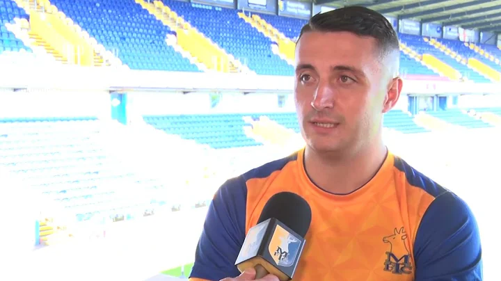 Anthony Hartigan signs for Mansfield