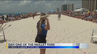 Crowds take to Flora-Bama for 40th anniversary of Flora-Bama Interstate Mullet Toss